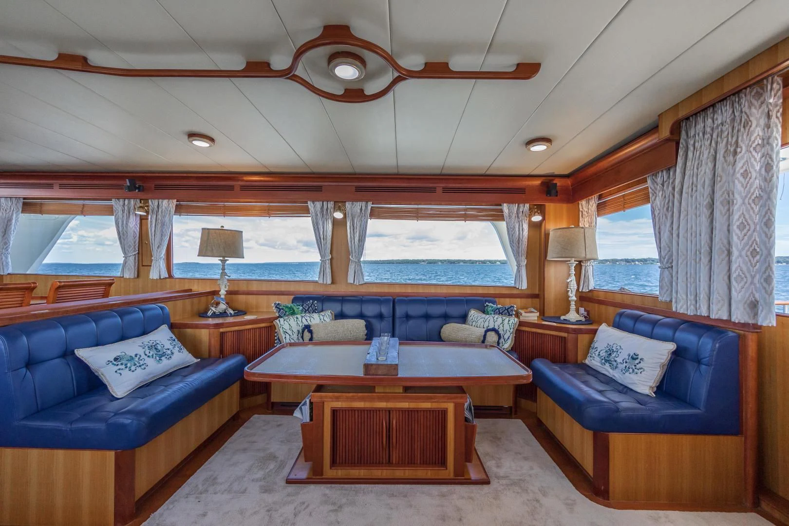 a living room with a large window aboard DISCONNECTED Yacht for Sale