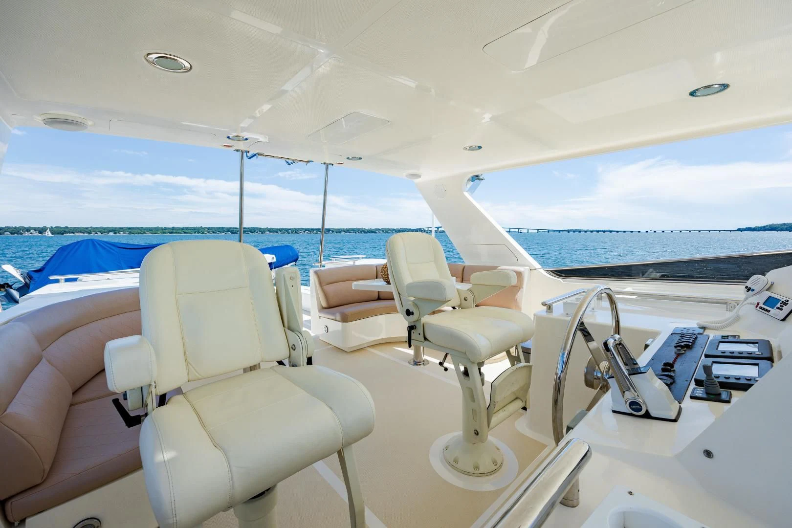 a boat with chairs and a table aboard DISCONNECTED Yacht for Sale