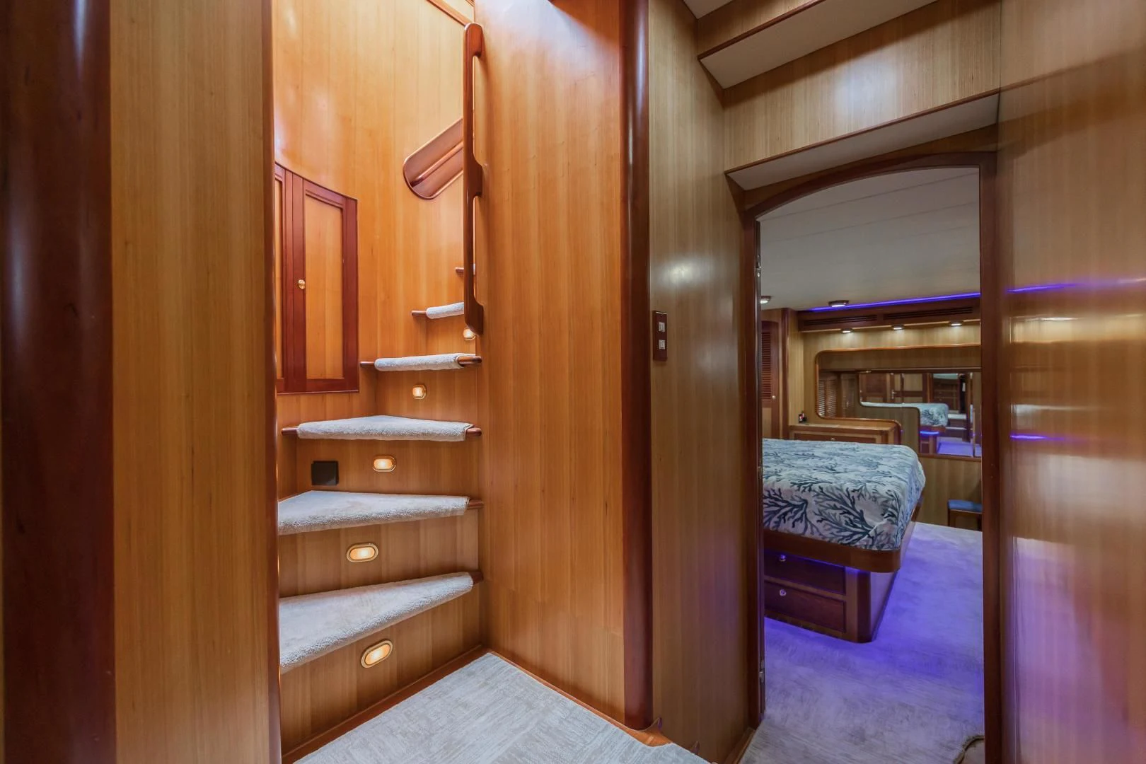 a room with a bed and a closet aboard DISCONNECTED Yacht for Sale
