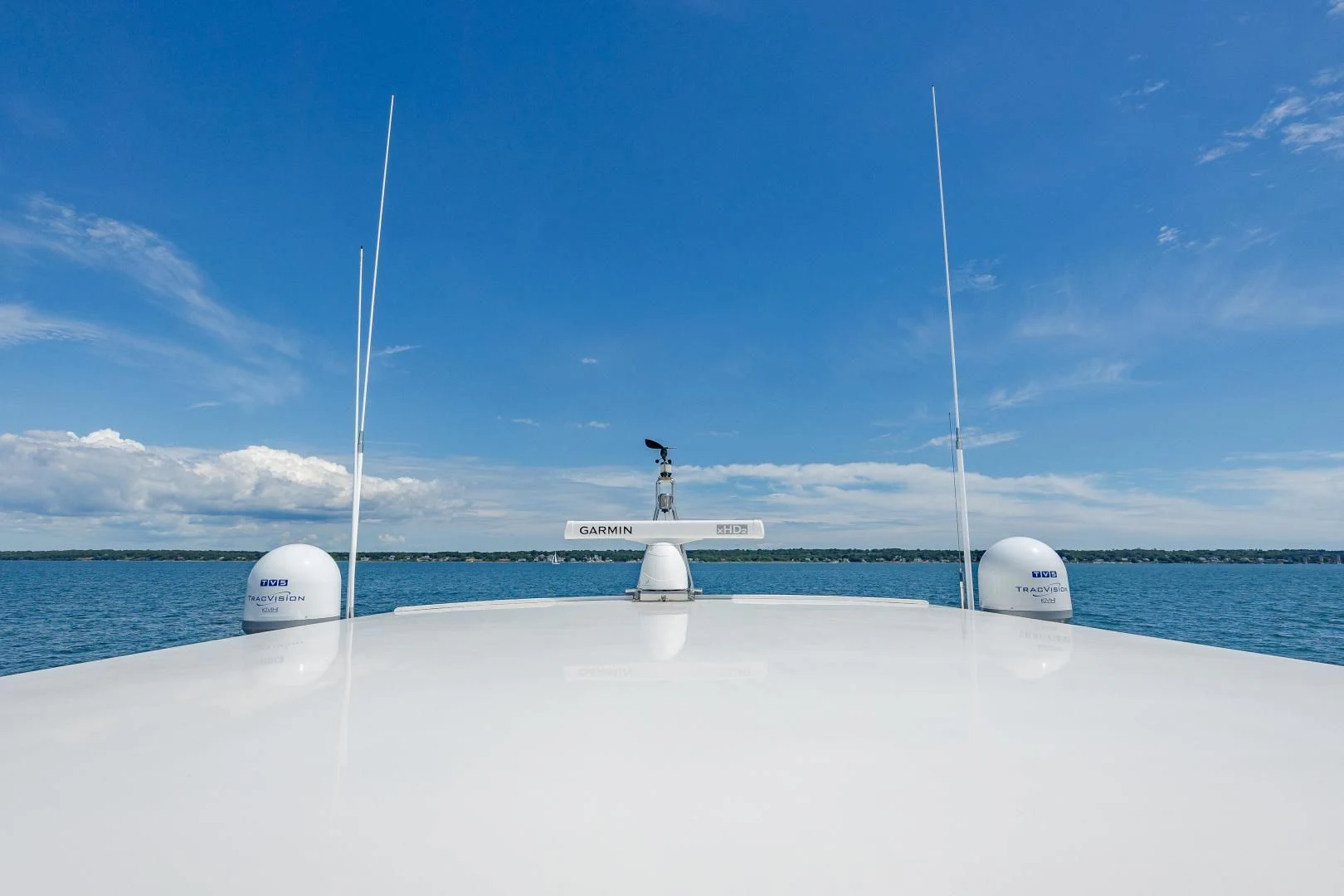 a person standing on a white object in the water aboard DISCONNECTED Yacht for Sale