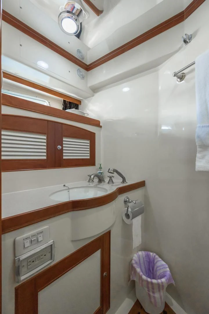 a bathroom with a sink and a shower aboard DISCONNECTED Yacht for Sale