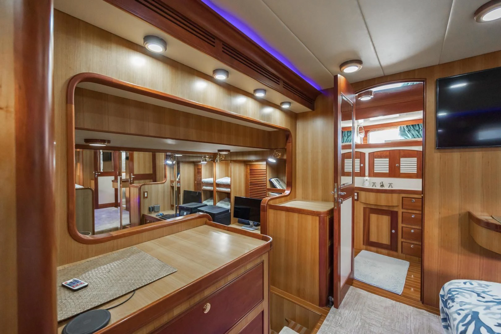 a room with a desk and a computer aboard DISCONNECTED Yacht for Sale