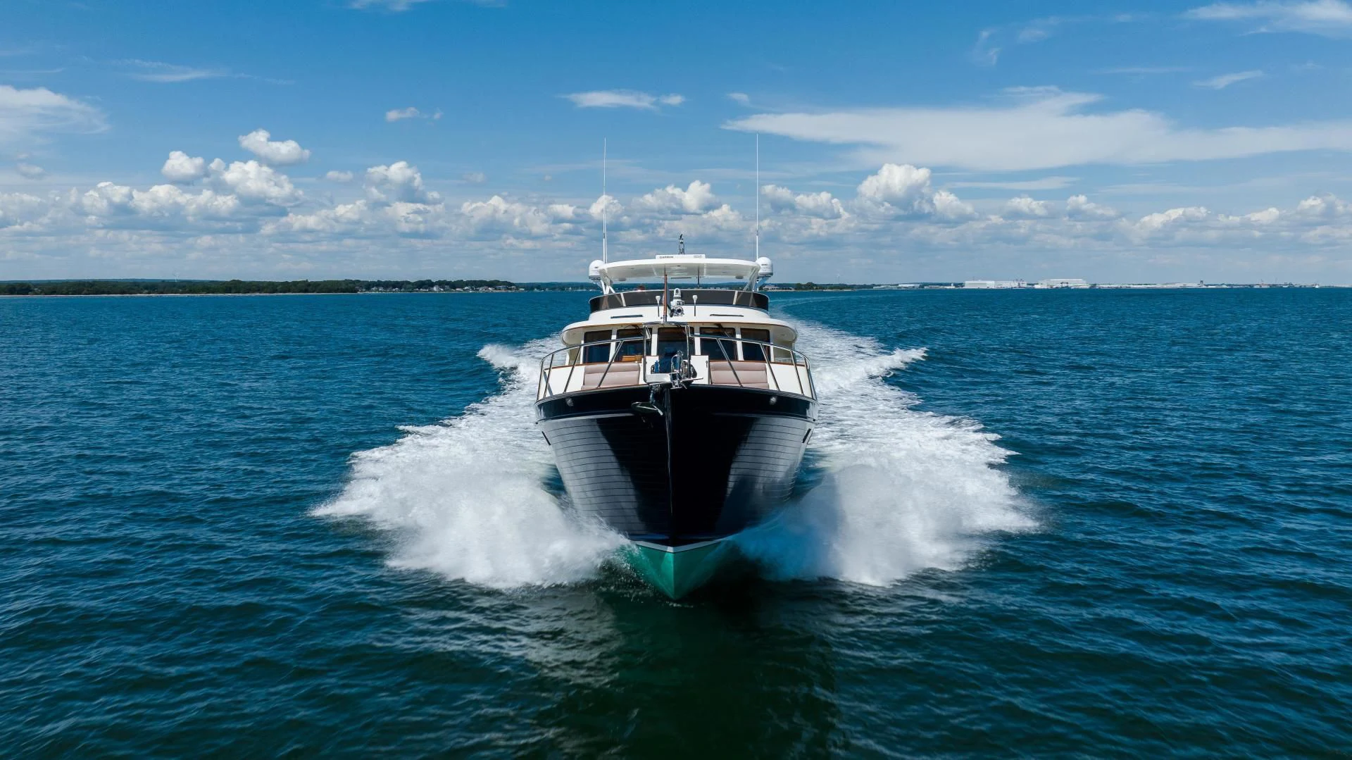 a boat on the water aboard DISCONNECTED Yacht for Sale