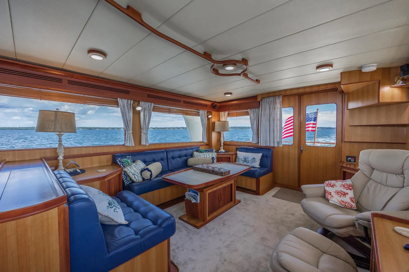a living room with a large window aboard DISCONNECTED Yacht for Sale