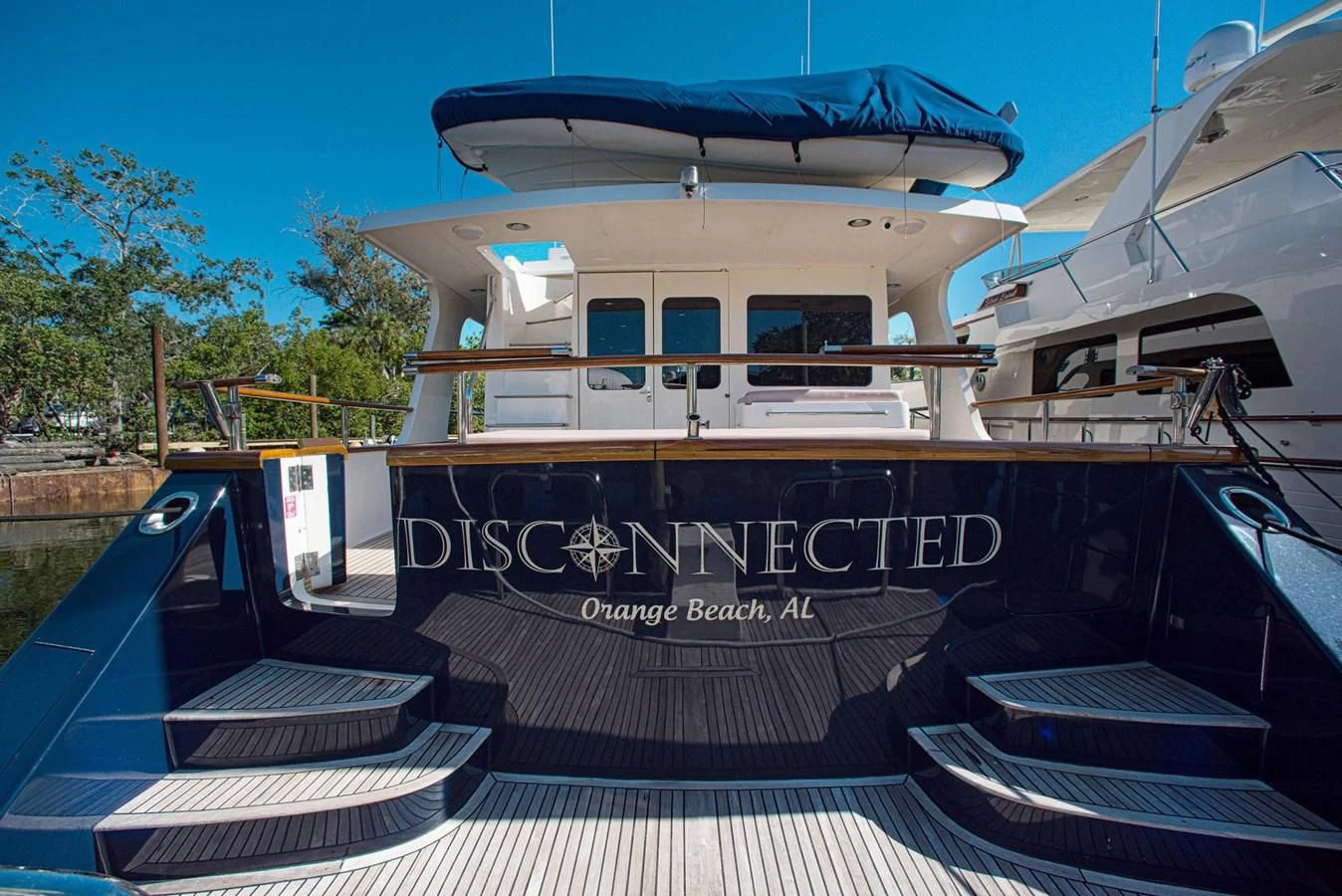 a boat with a deck aboard DISCONNECTED Yacht for Sale