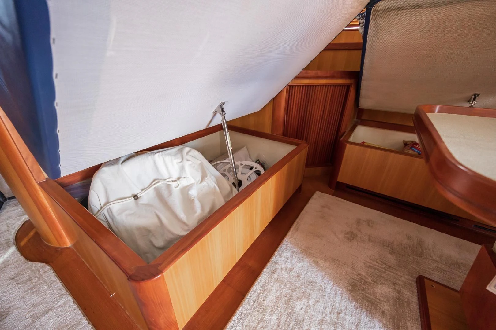 a room with a sink and a bed aboard DISCONNECTED Yacht for Sale
