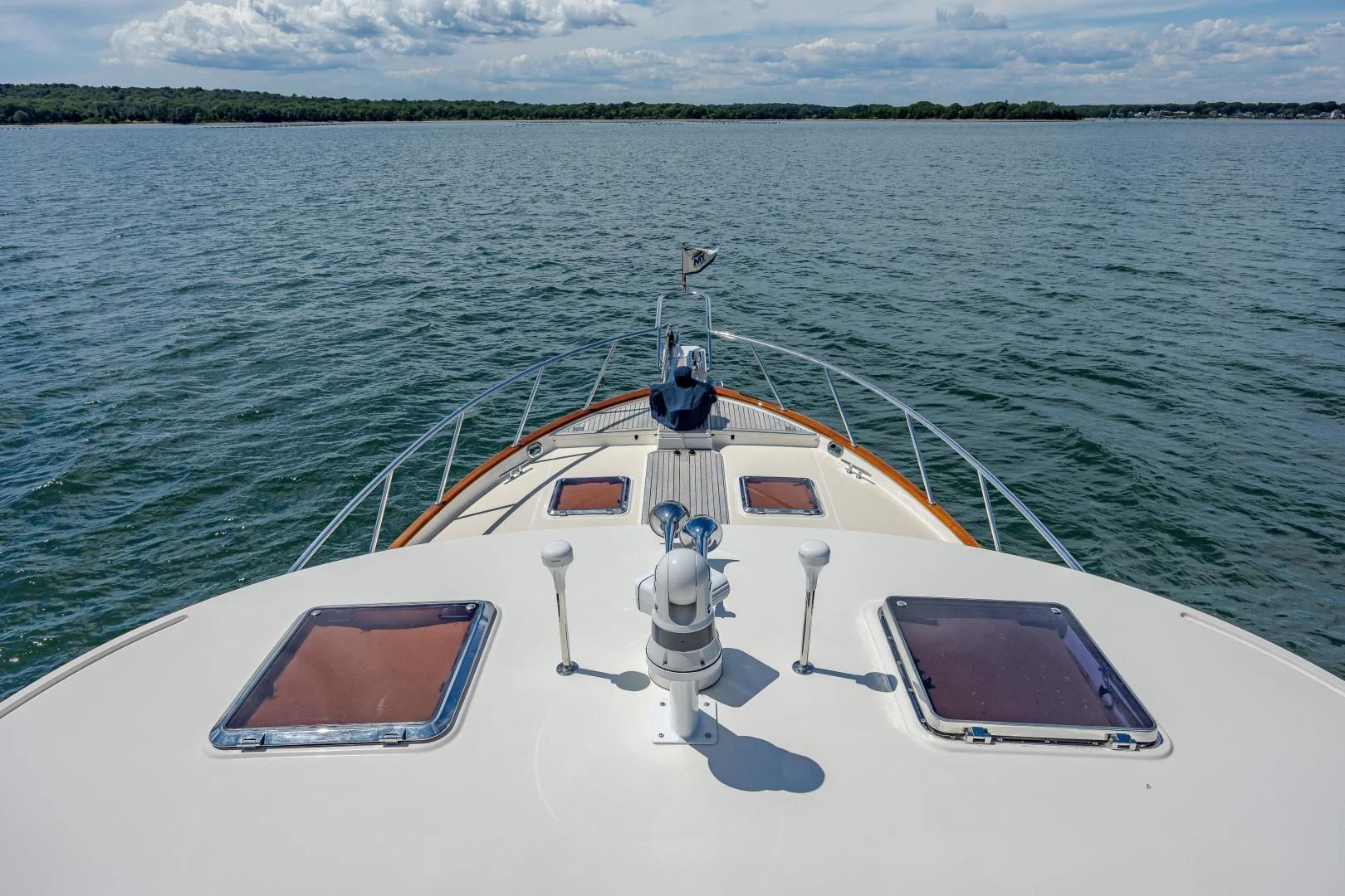 a boat in the water aboard DISCONNECTED Yacht for Sale