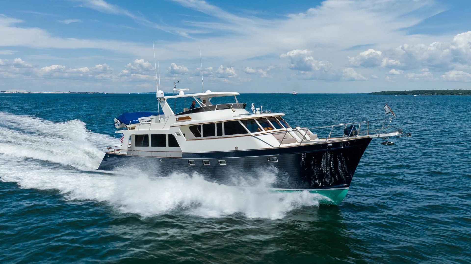 a boat on the water aboard DISCONNECTED Yacht for Sale