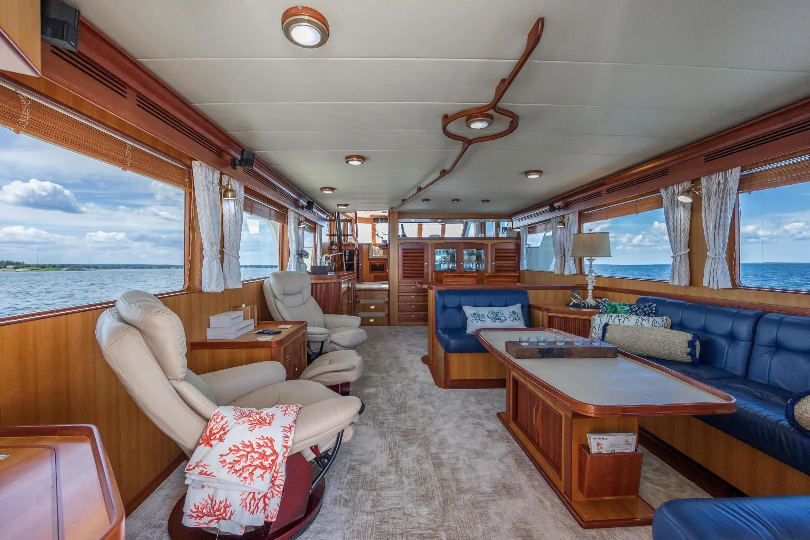 a living room with a large window aboard DISCONNECTED Yacht for Sale