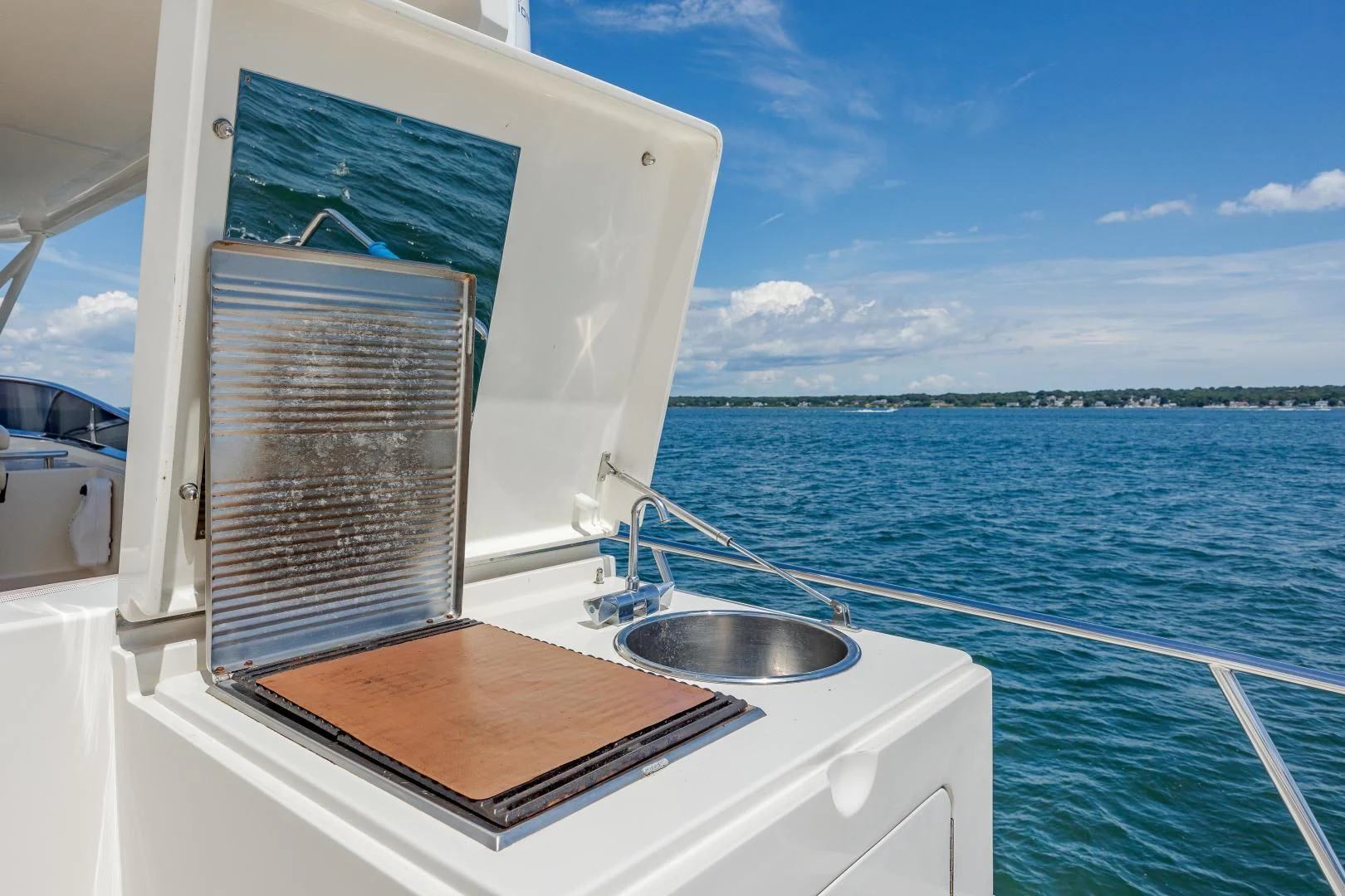 a boat with a book on it aboard DISCONNECTED Yacht for Sale