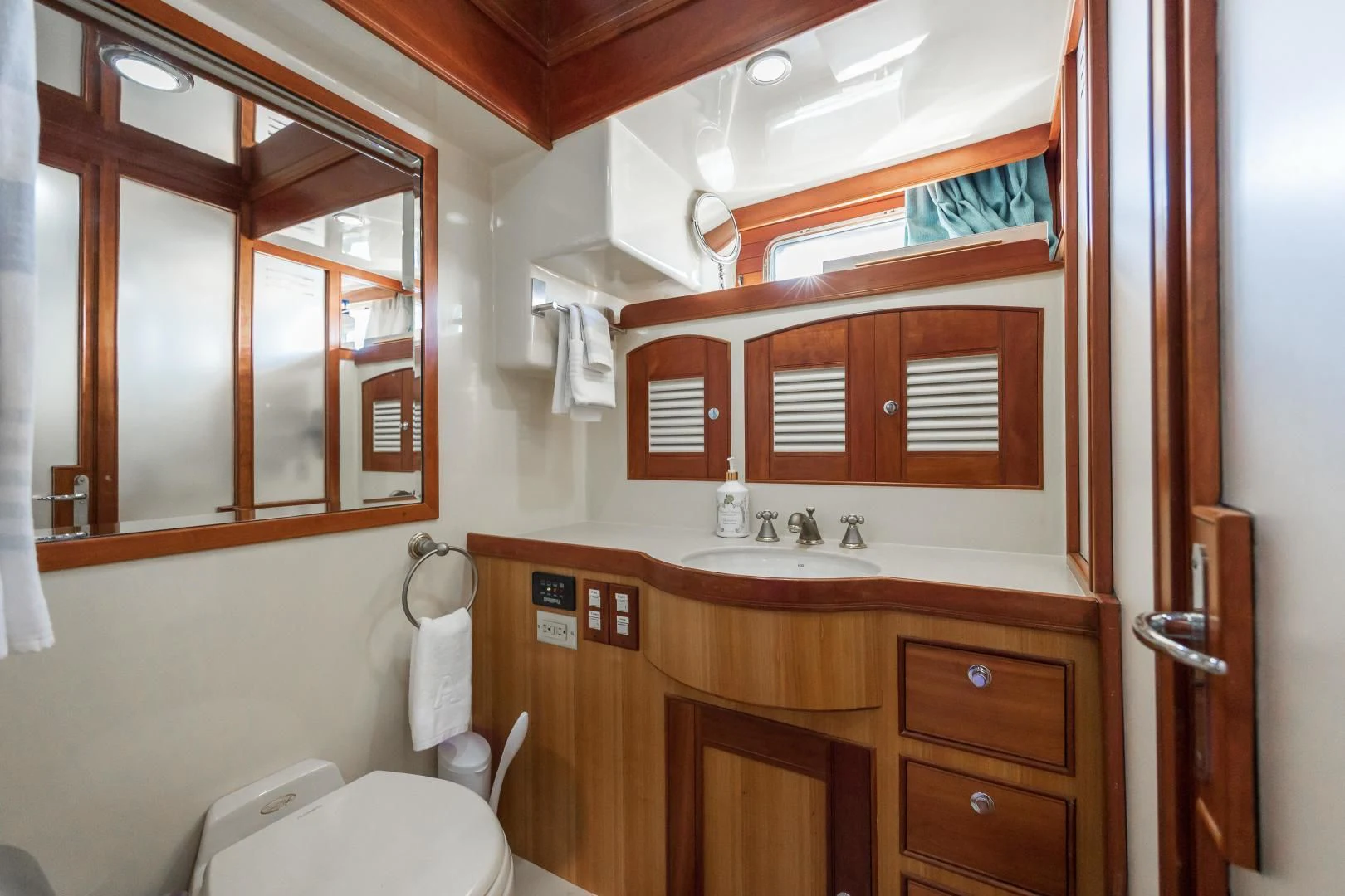a bathroom with a sink and a toilet aboard DISCONNECTED Yacht for Sale