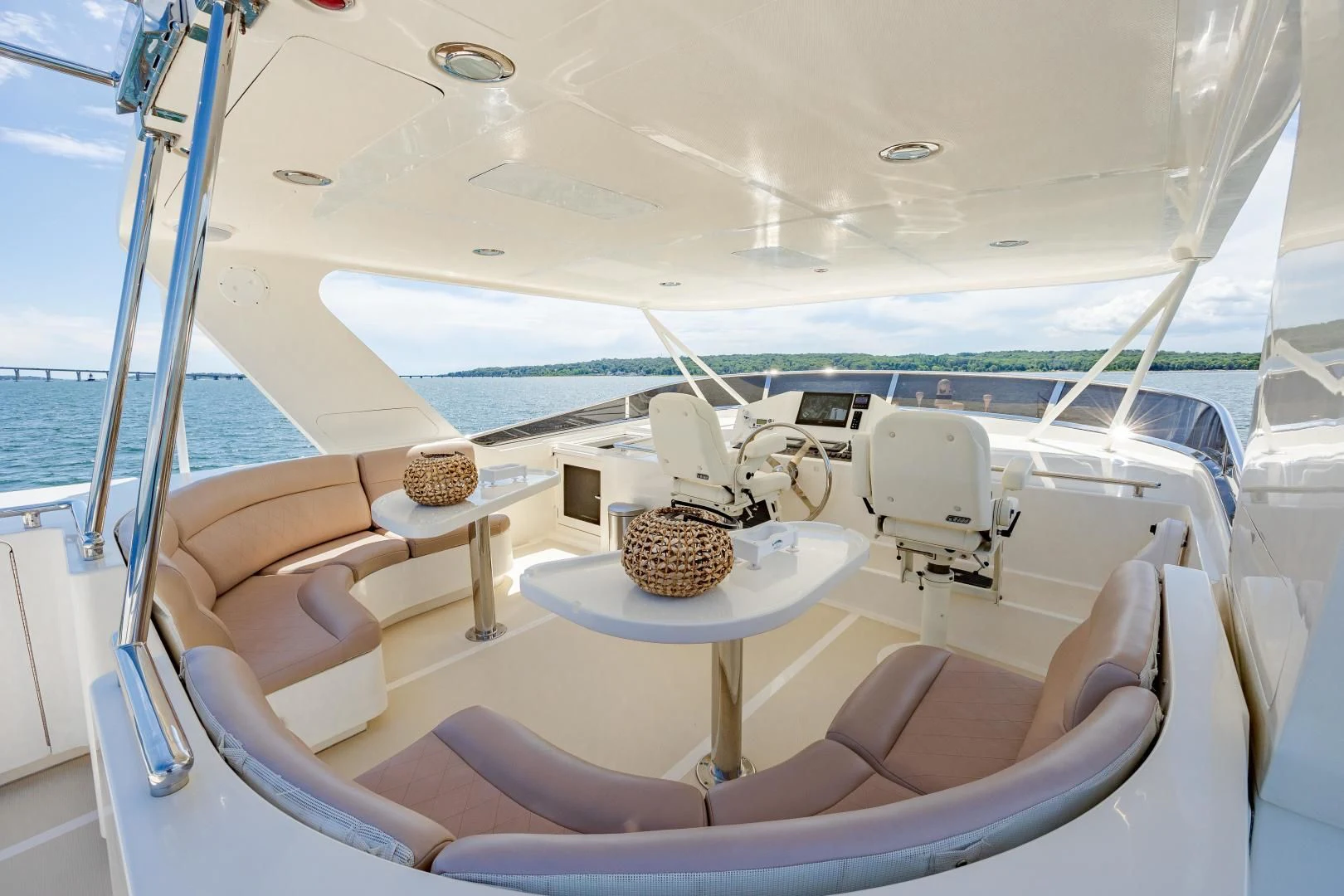 a boat with a table and chairs on it aboard DISCONNECTED Yacht for Sale