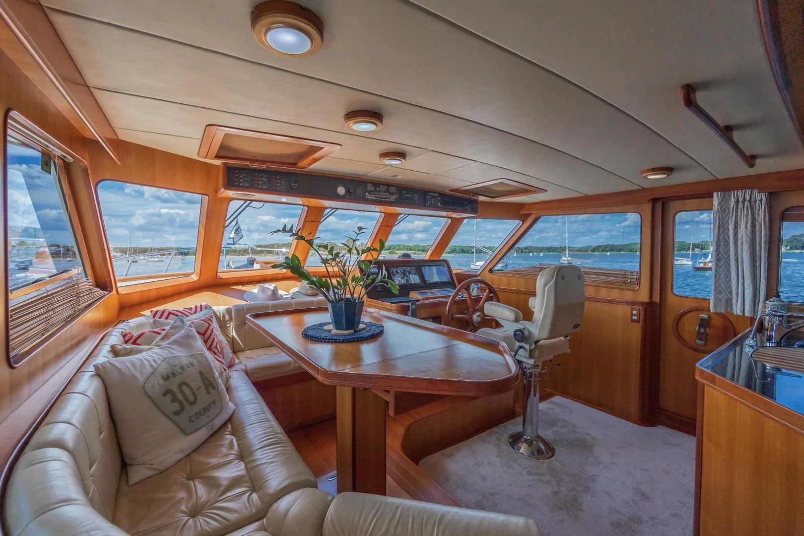 a bus with a table and chairs aboard DISCONNECTED Yacht for Sale