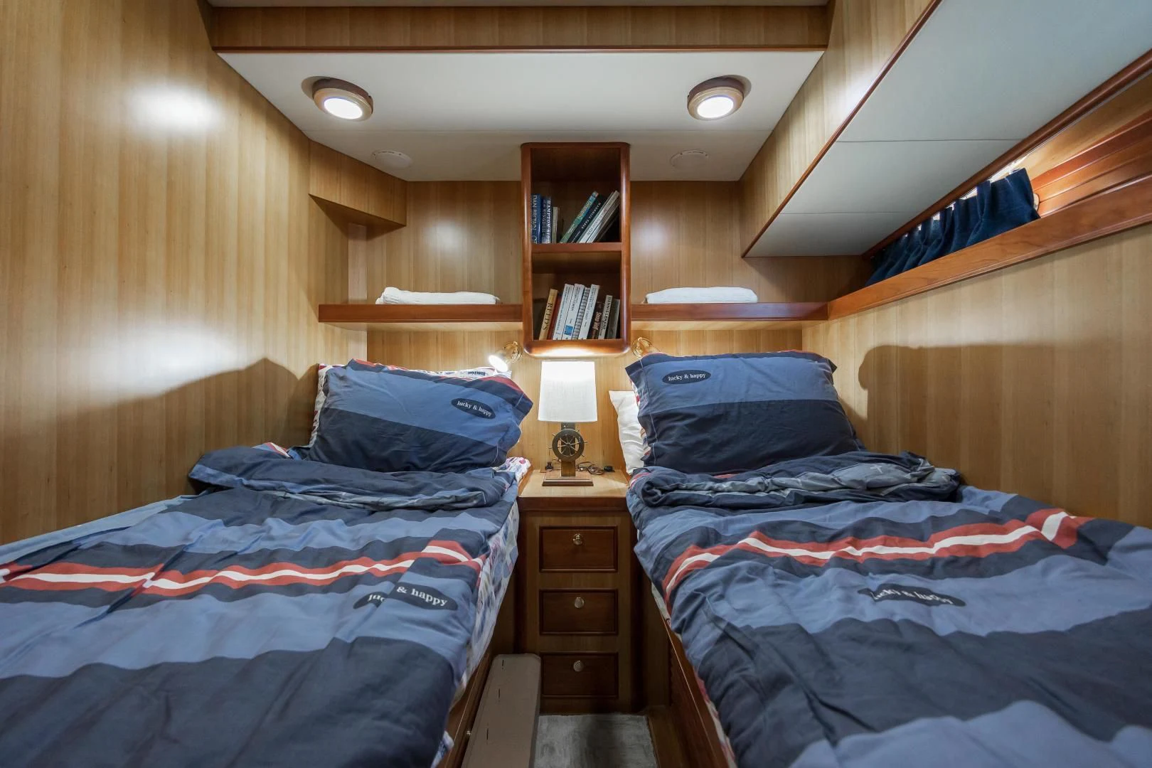 a couple of beds in a hotel room aboard DISCONNECTED Yacht for Sale