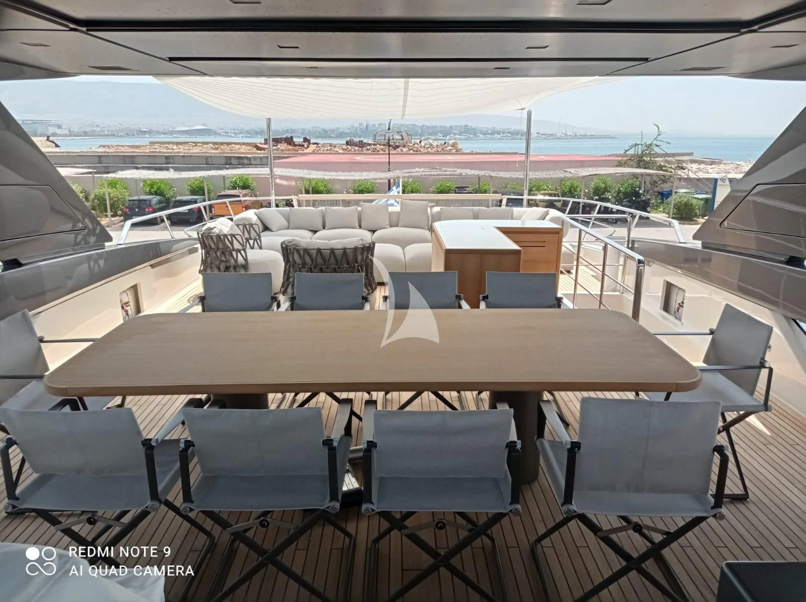 a large room with a table and chairs aboard MARY Yacht for Sale