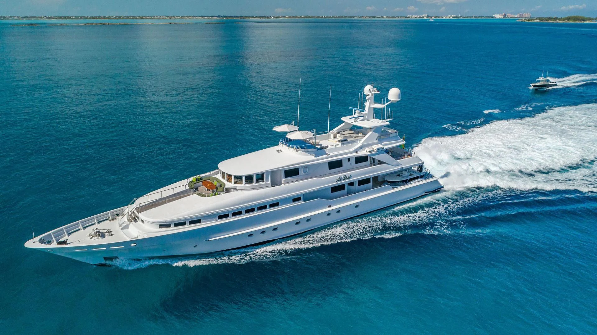 a white yacht on the water aboard AT LAST Yacht for Charter