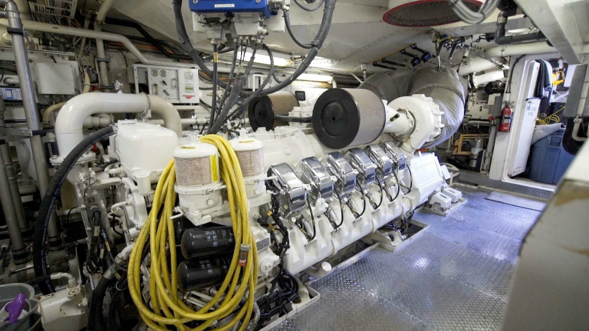 a machine with a yellow handle aboard AT LAST Yacht for Charter