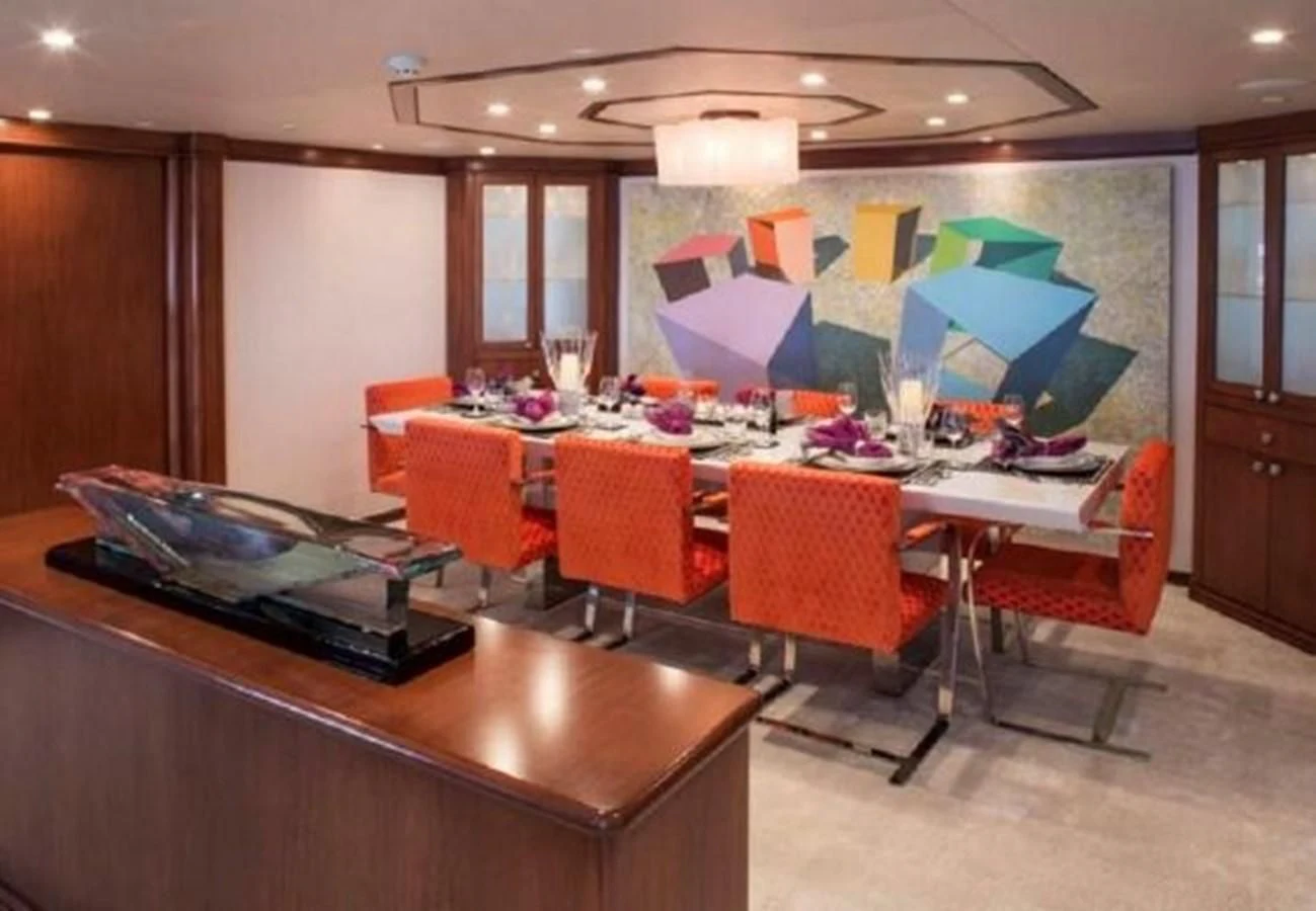 a conference room with a table and chairs aboard AT LAST Yacht for Charter