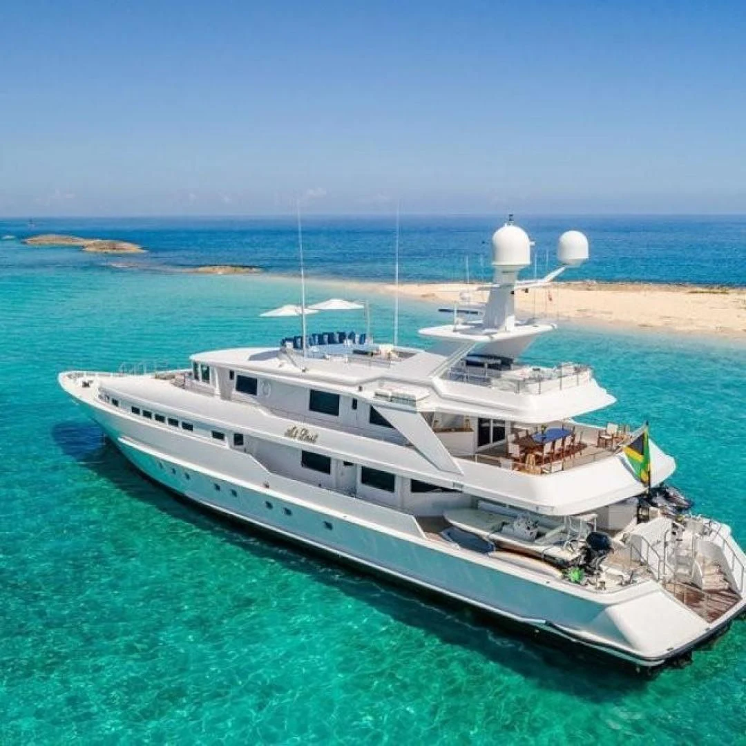 a large ship in the water aboard AT LAST Yacht for Charter