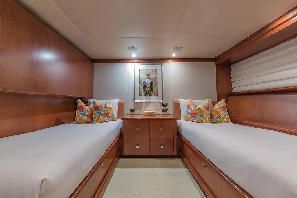 a room with two beds aboard AT LAST Yacht for Charter