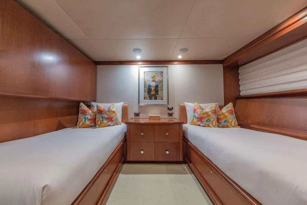 a room with two beds aboard AT LAST Yacht for Charter