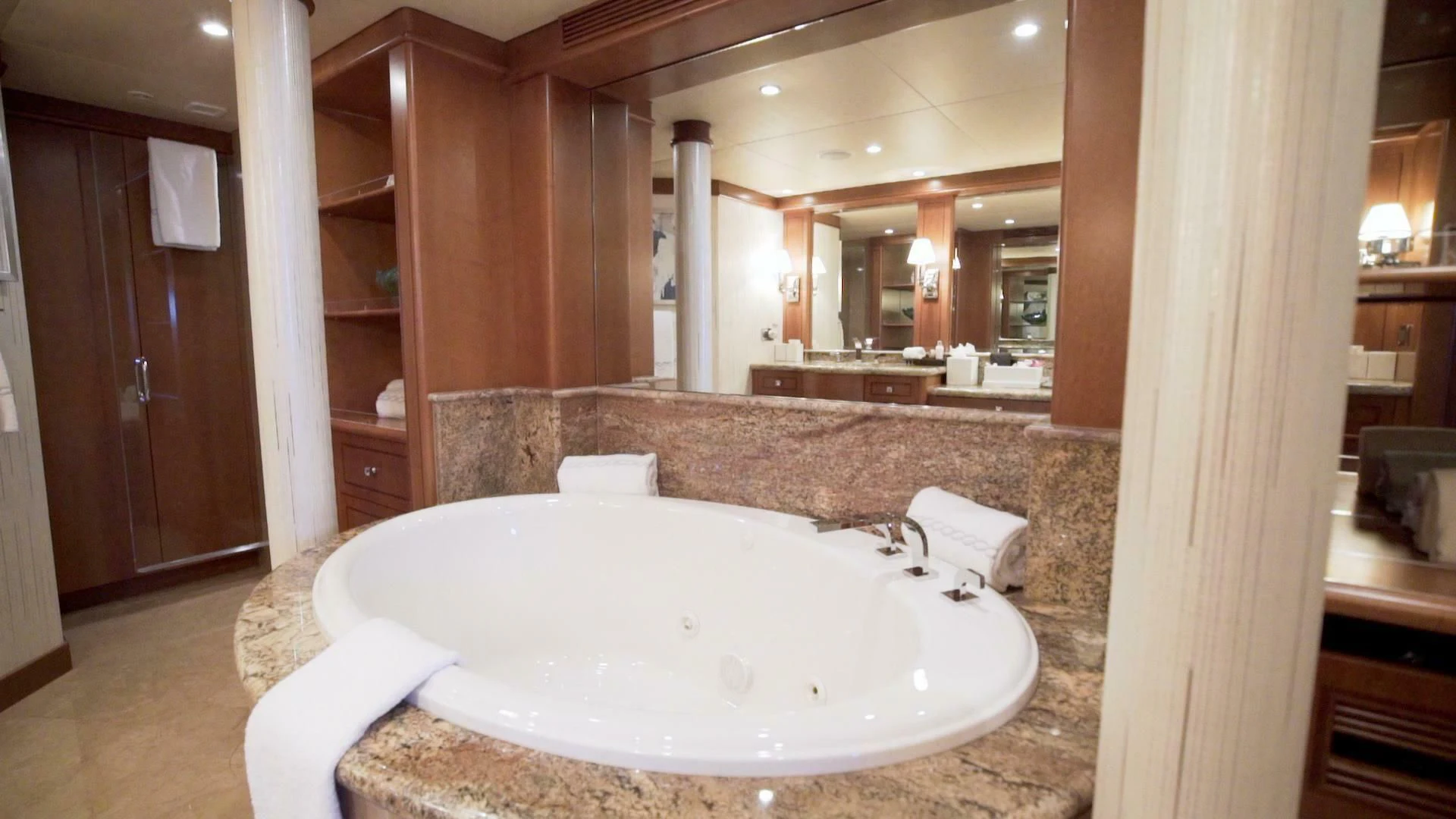 a large bathroom with a large bathtub aboard AT LAST Yacht for Charter