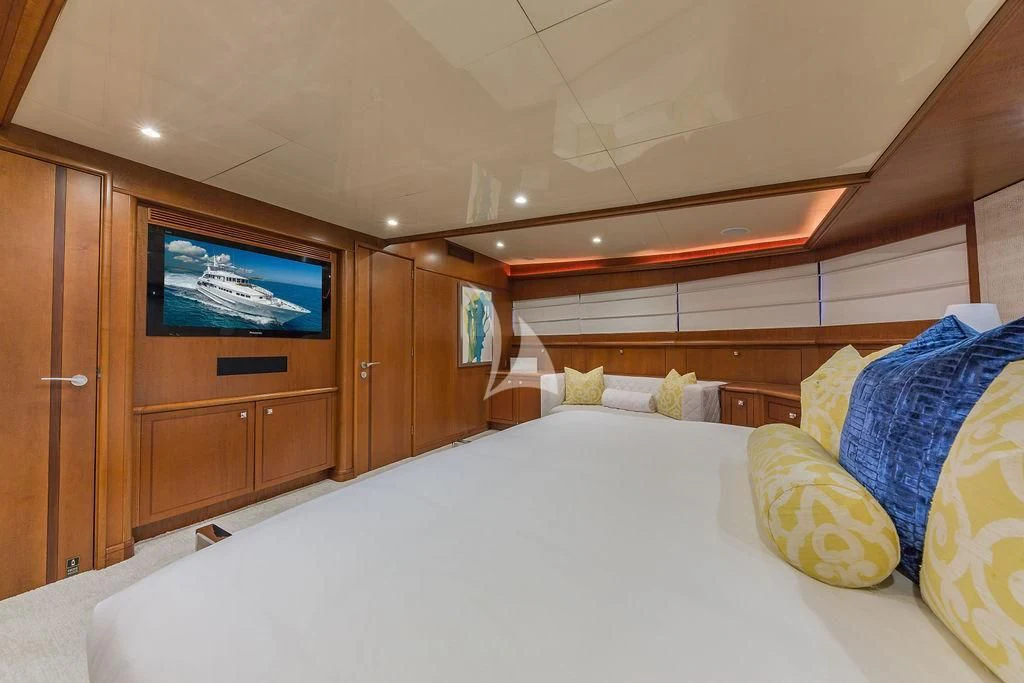 a bed in a room aboard AT LAST Yacht for Charter