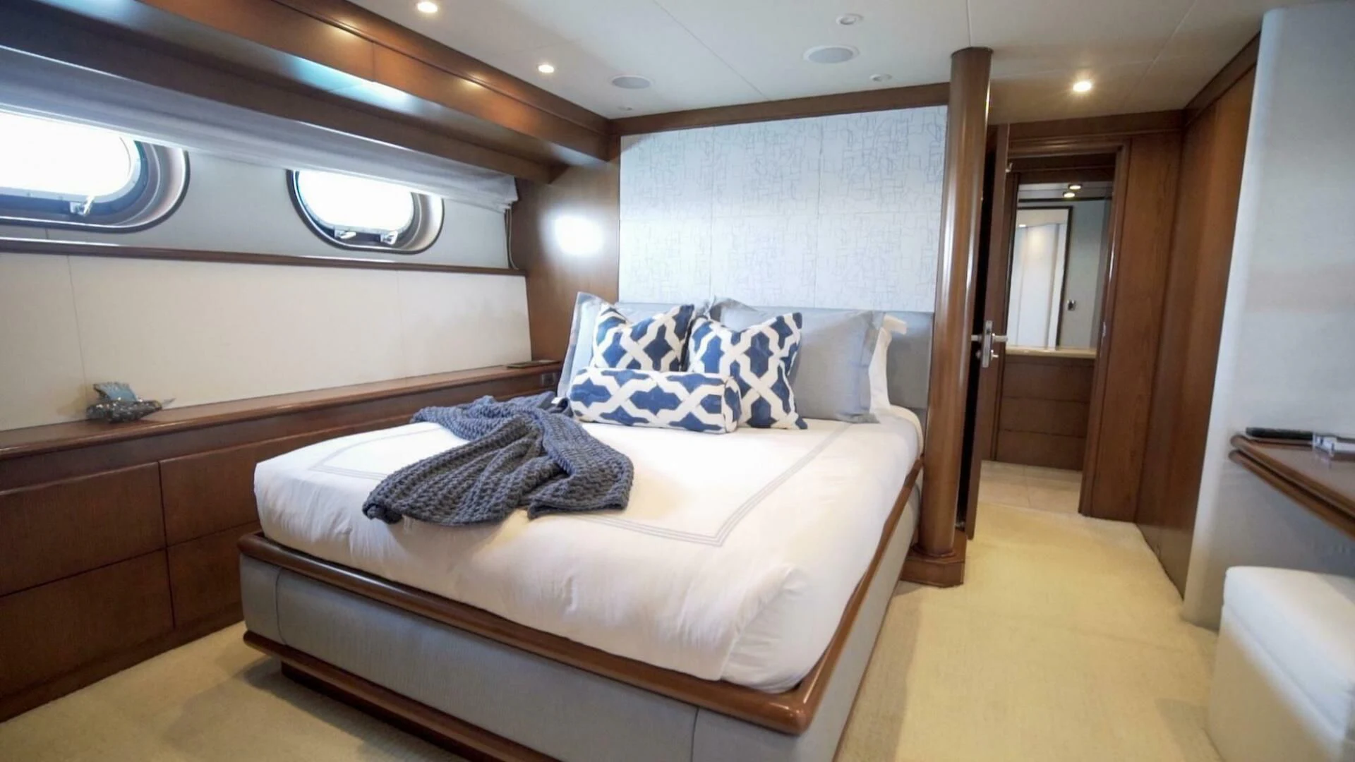 a bed in a room aboard AT LAST Yacht for Charter