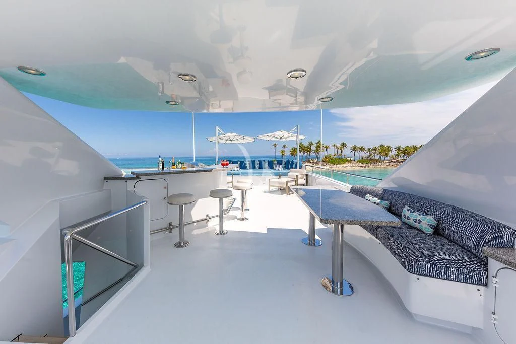 a room with a bed and a desk aboard AT LAST Yacht for Charter
