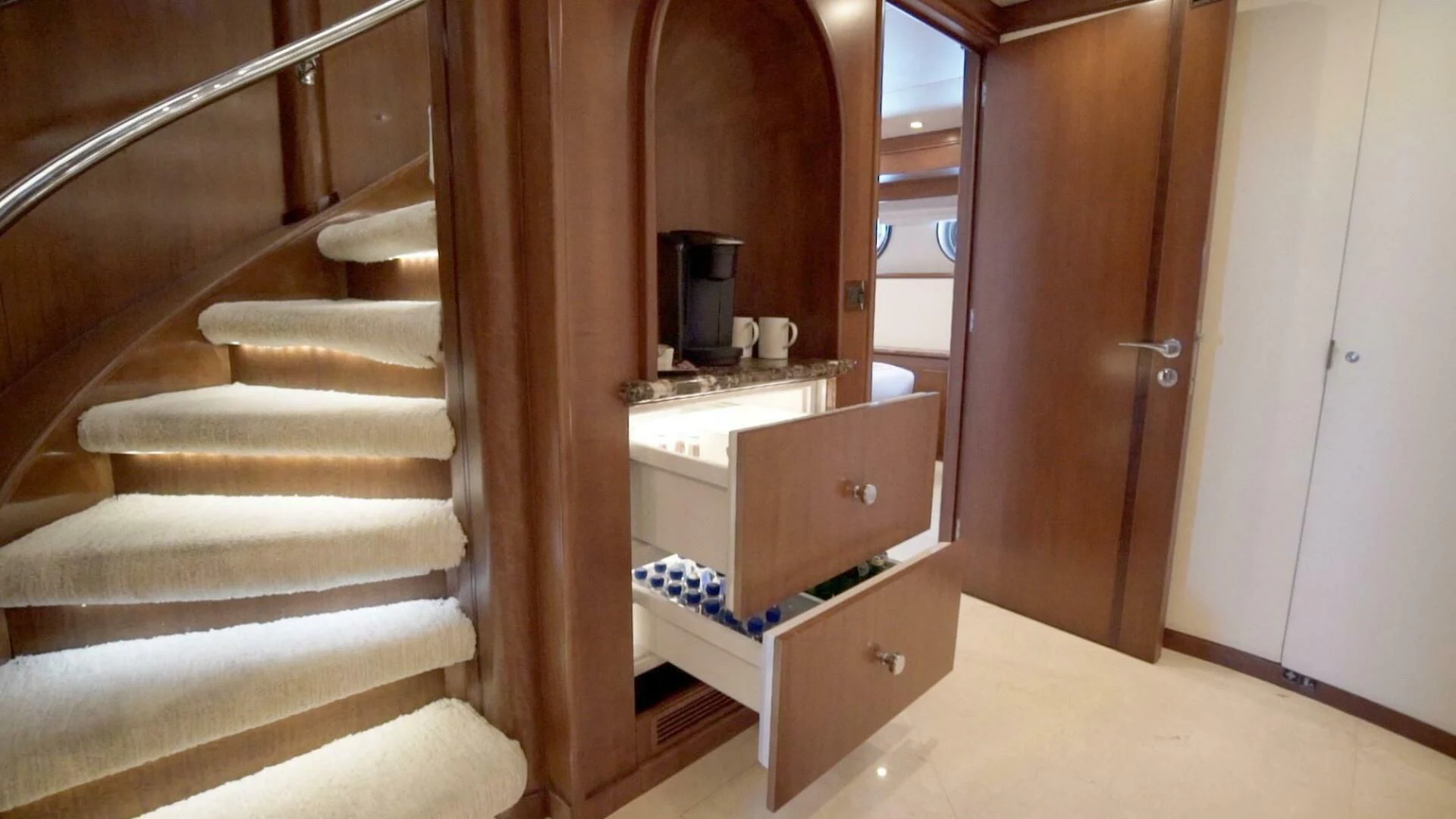 a staircase in a room aboard AT LAST Yacht for Charter