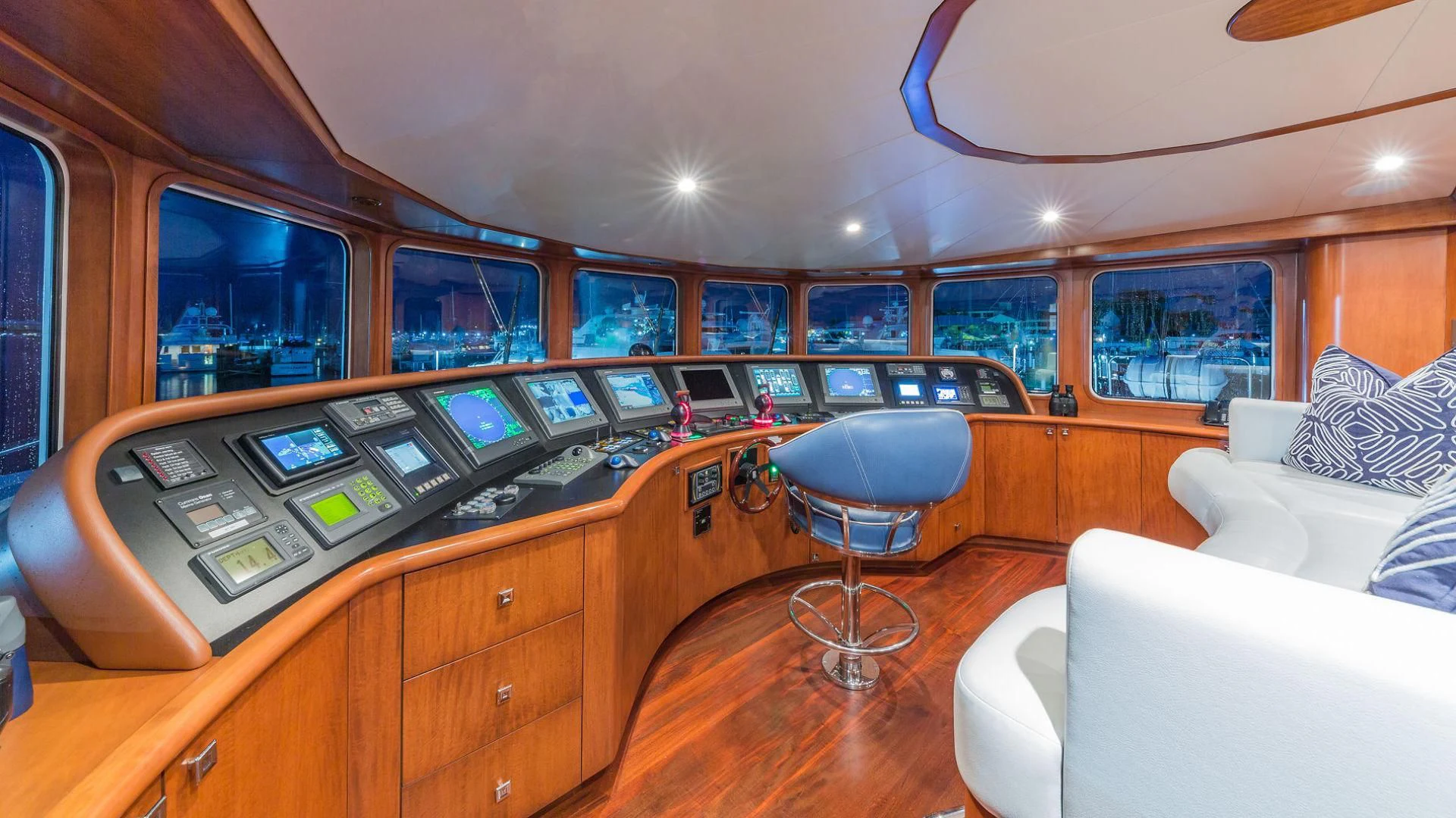 a room with a desk and chairs aboard AT LAST Yacht for Charter