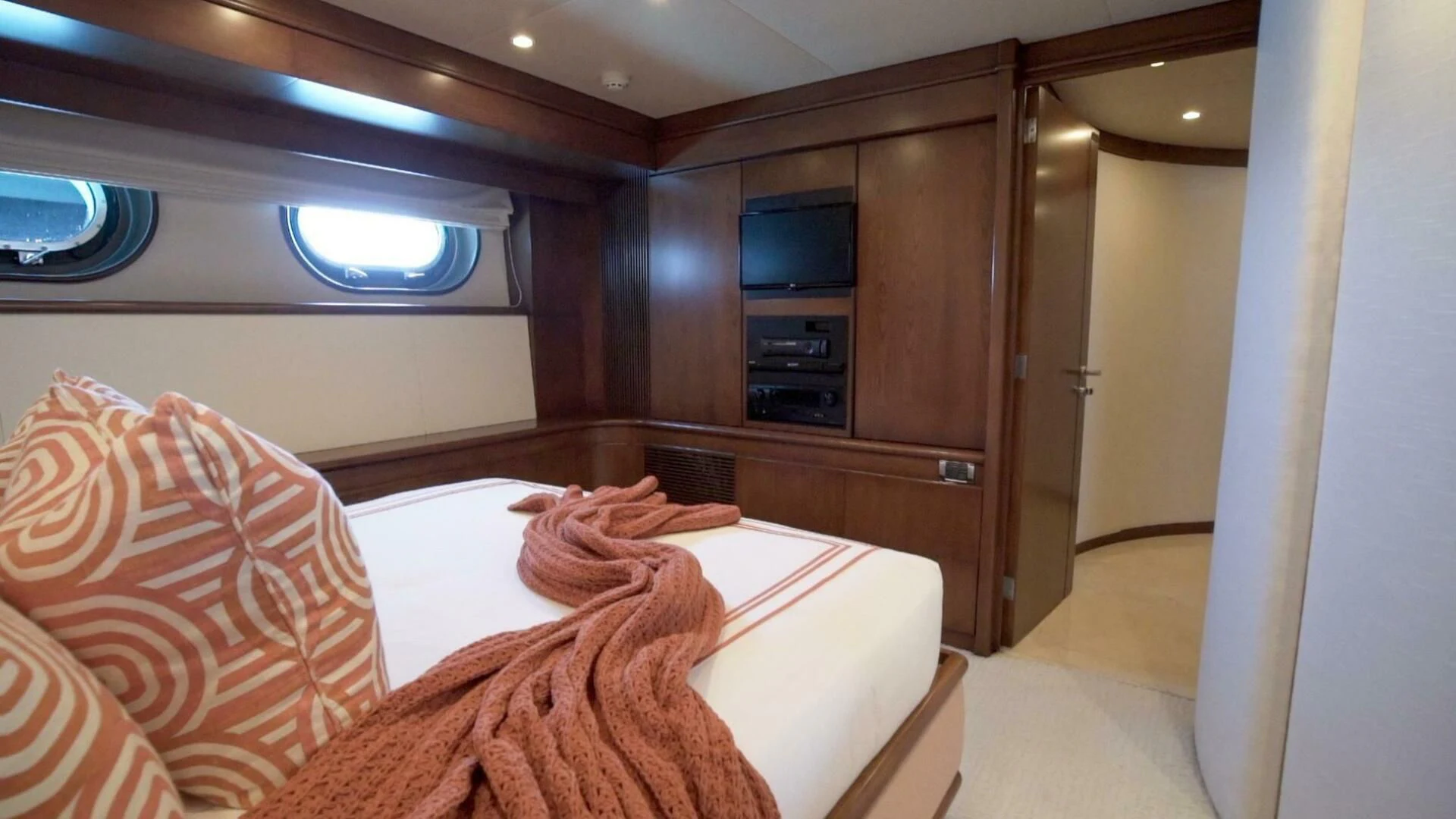 a bed in a room aboard AT LAST Yacht for Charter