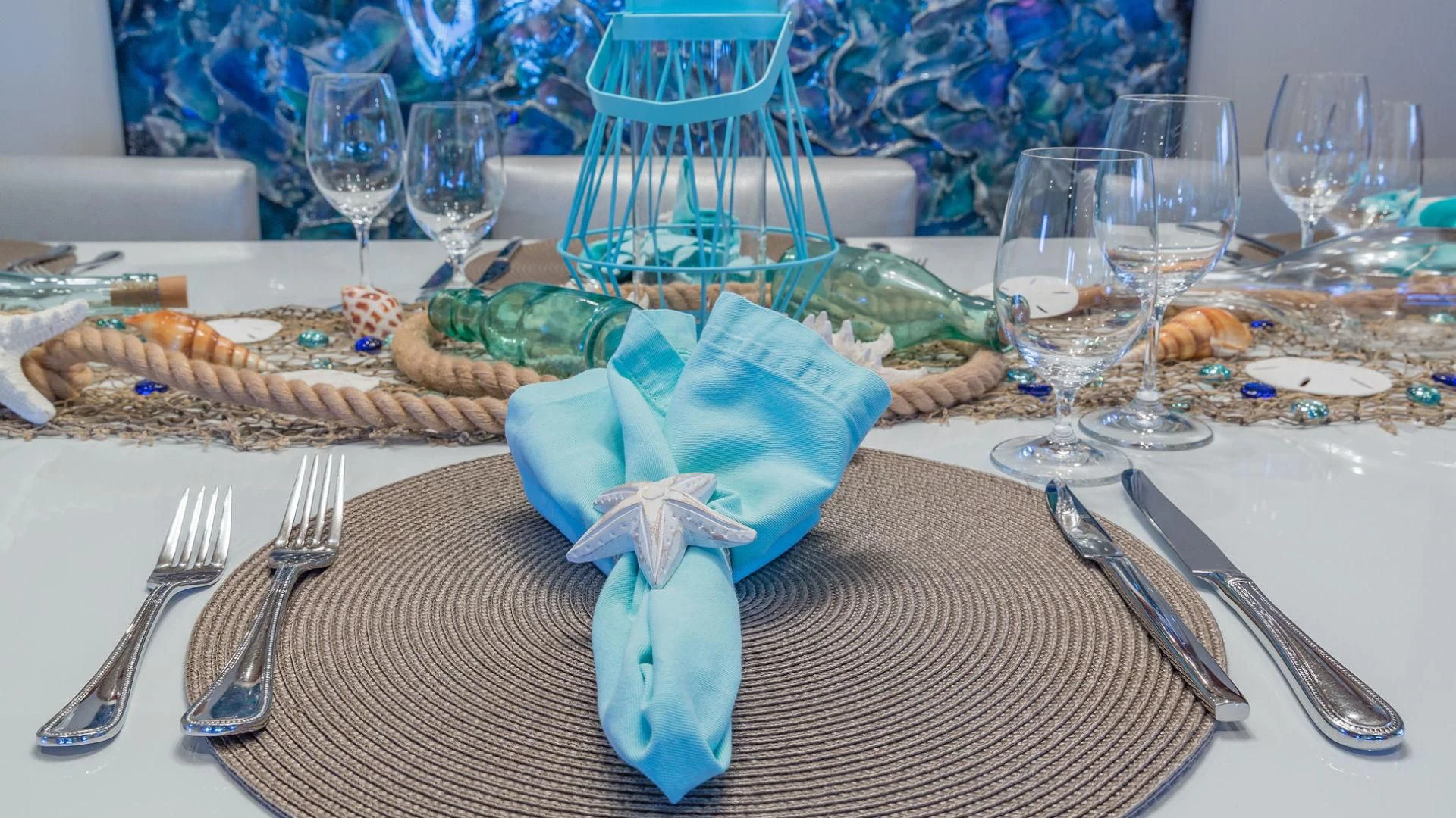 a table with food and glasses aboard AT LAST Yacht for Charter