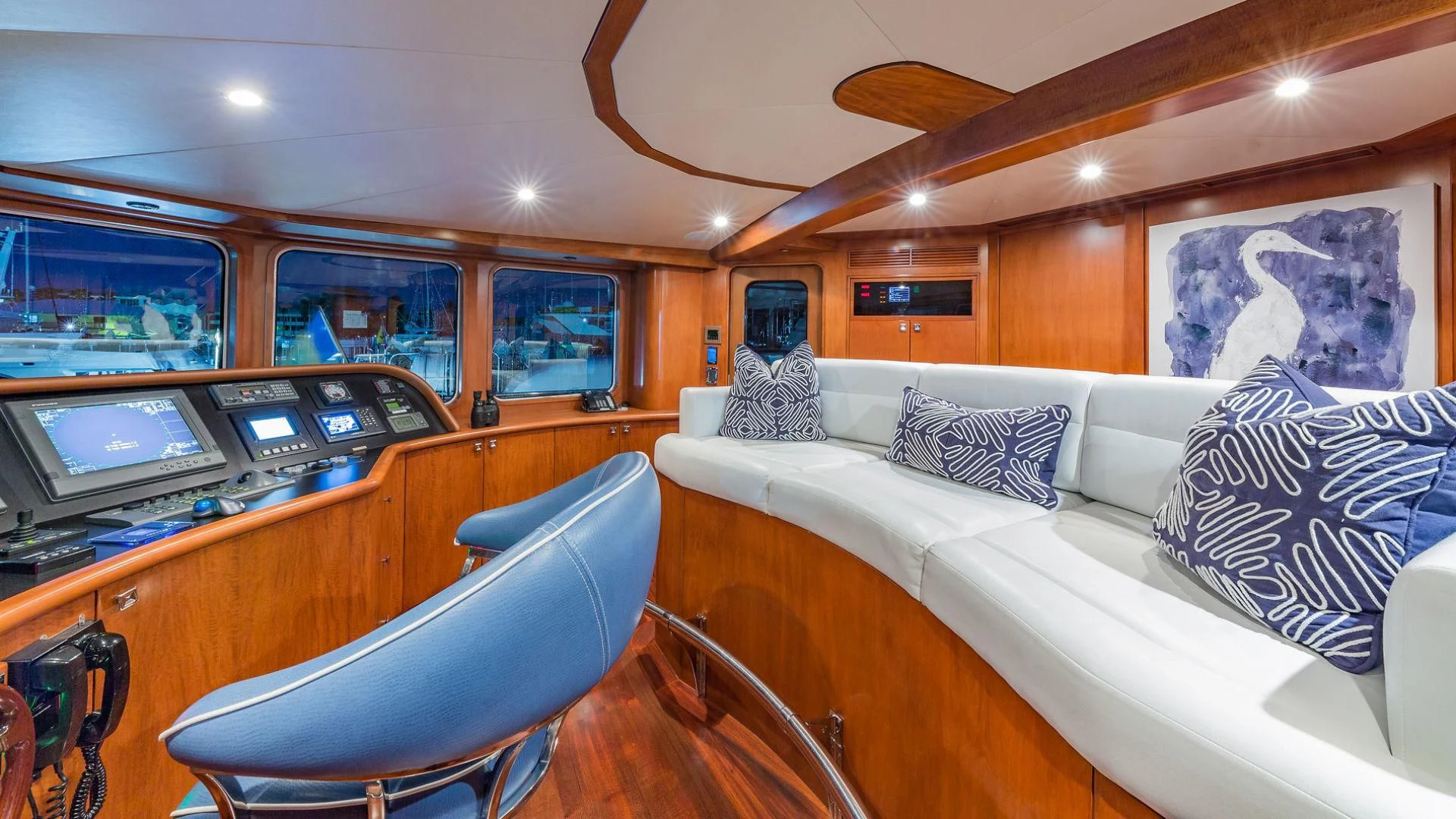 a room with a bed and a desk aboard AT LAST Yacht for Charter