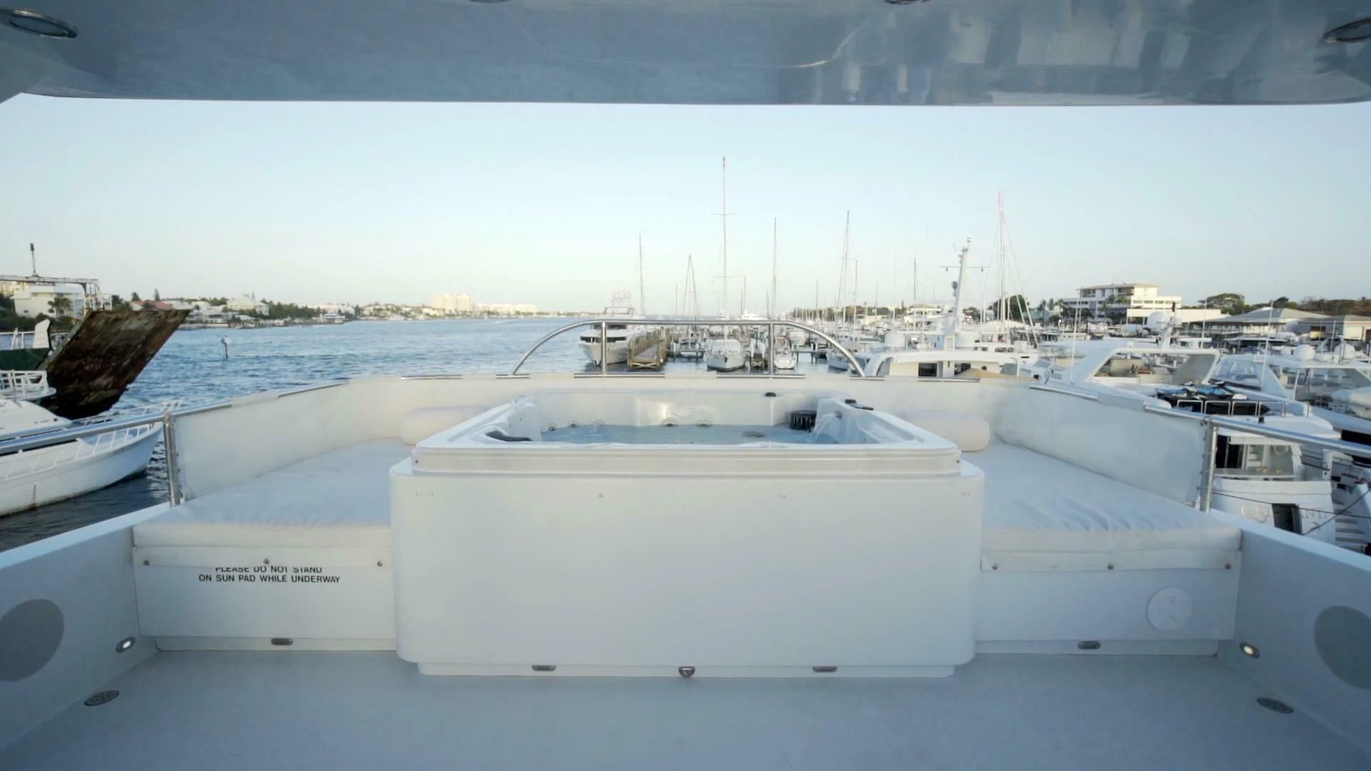 a group of boats in a harbor aboard AT LAST Yacht for Charter