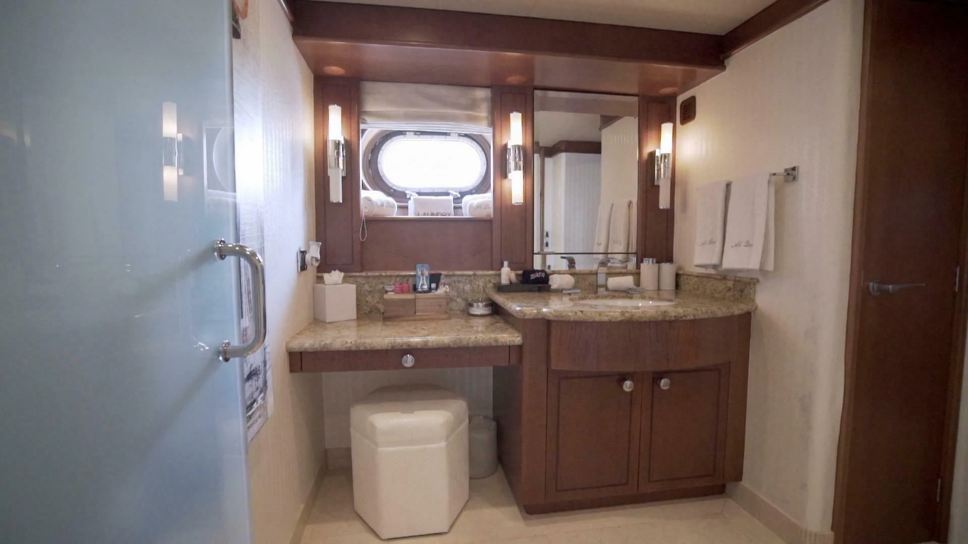 a bathroom with a sink and a mirror aboard AT LAST Yacht for Charter