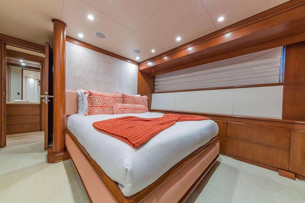 a bed in a room aboard AT LAST Yacht for Charter
