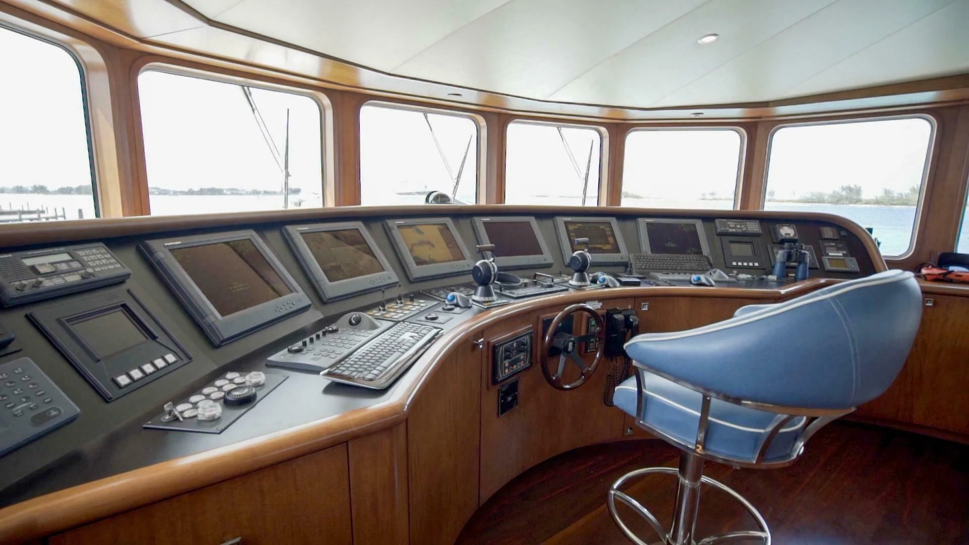 a control room with a desk and computer aboard AT LAST Yacht for Charter