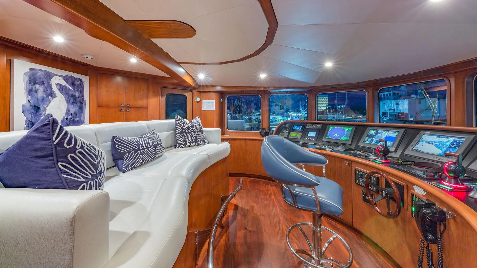 a living room with a large desk aboard AT LAST Yacht for Charter