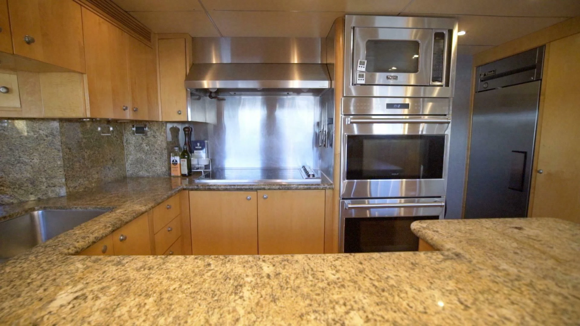 a kitchen with a large oven aboard AT LAST Yacht for Charter