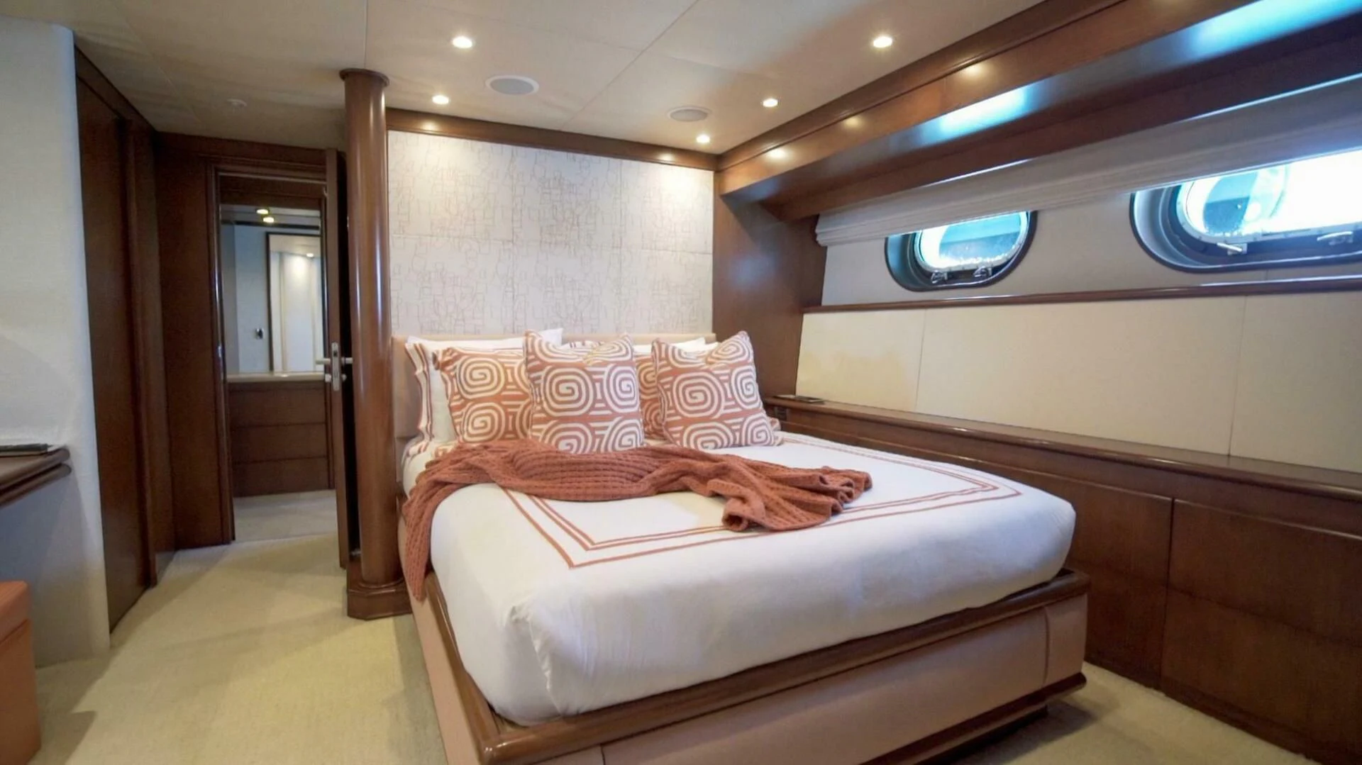 a bed in a room aboard AT LAST Yacht for Charter