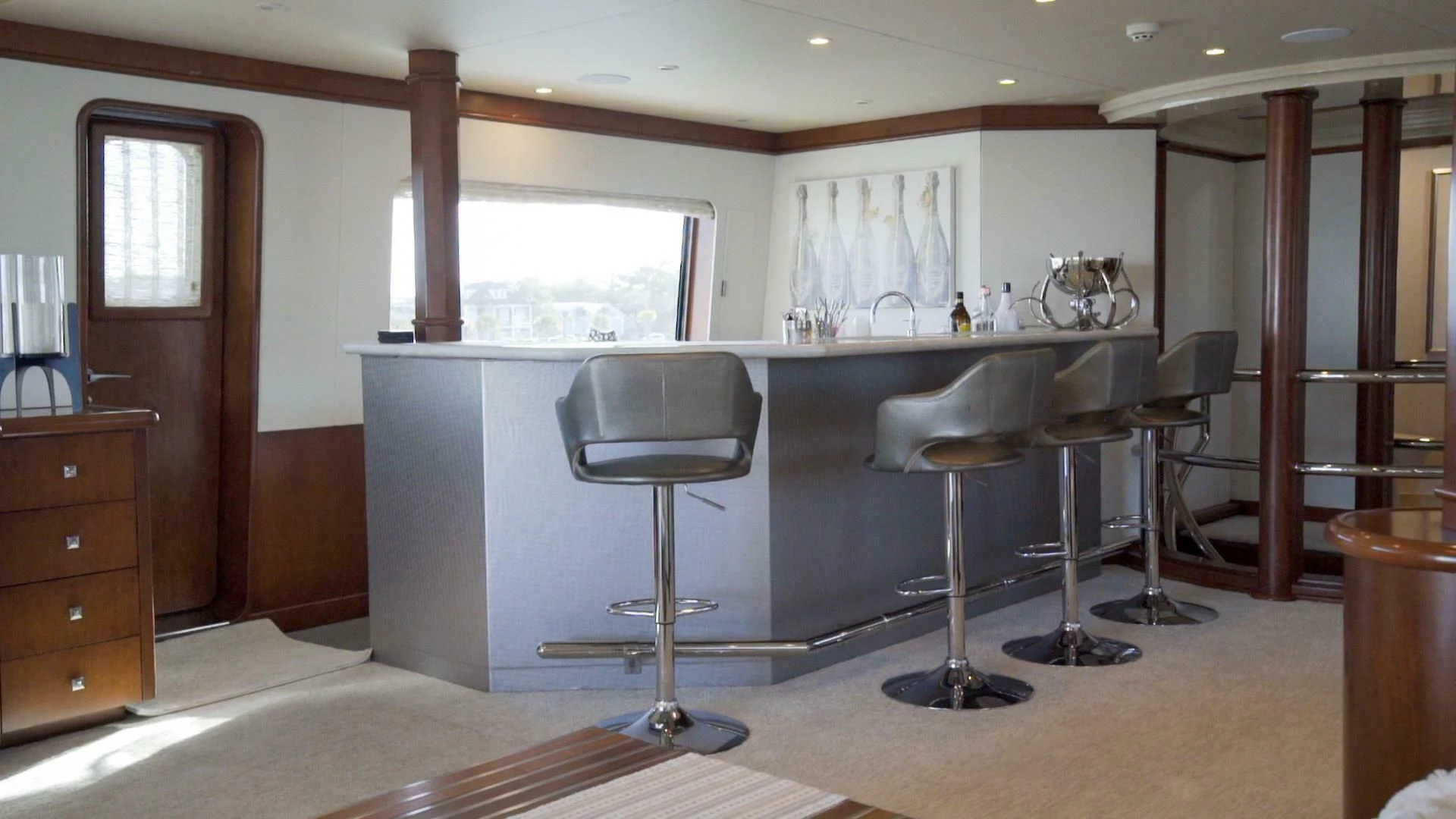 a kitchen with a large island aboard AT LAST Yacht for Charter