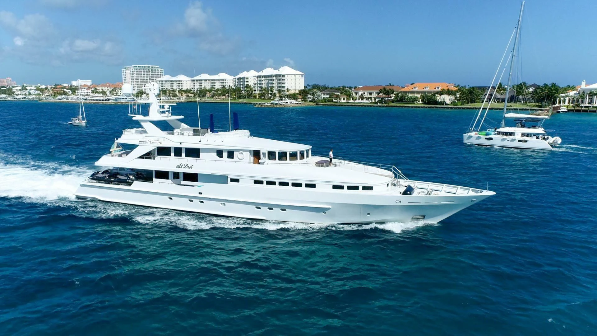 a white yacht on the water aboard AT LAST Yacht for Charter