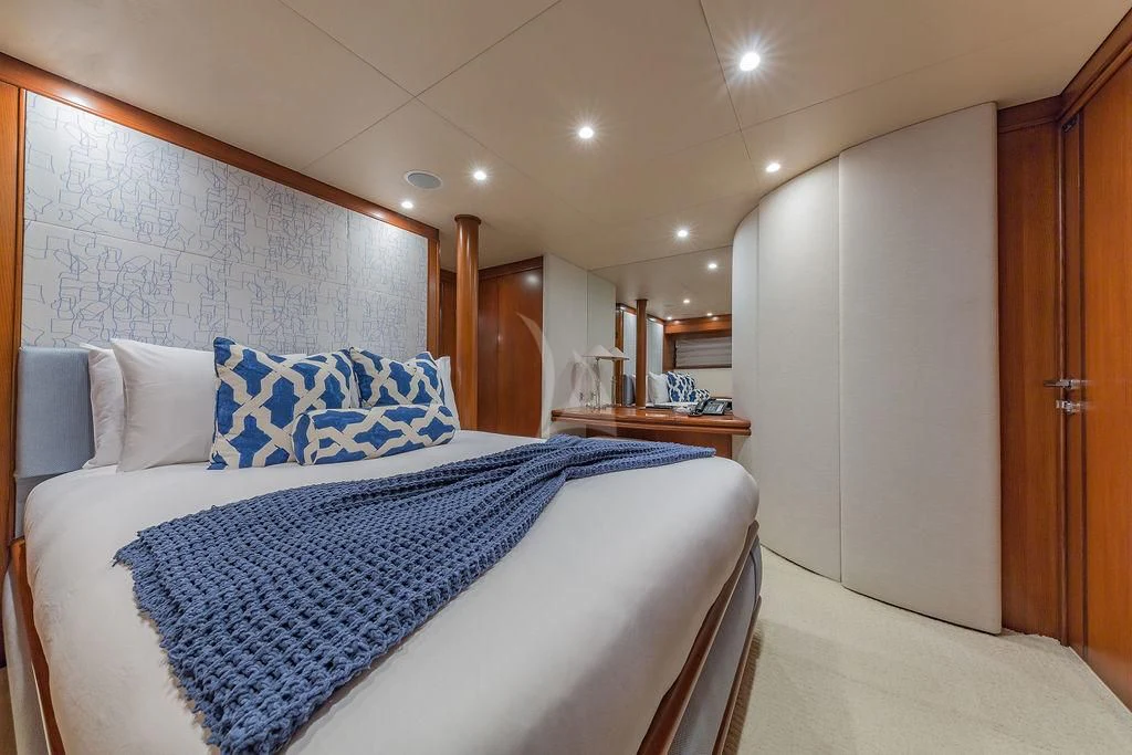 a bed in a room aboard AT LAST Yacht for Charter