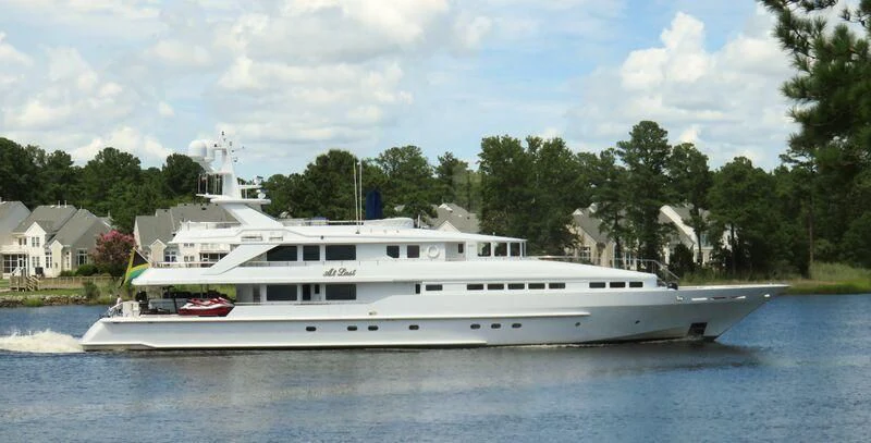 a white yacht on water aboard AT LAST Yacht for Charter
