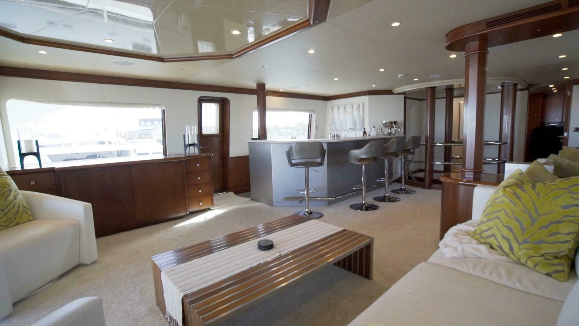 a room with a bed and a desk aboard AT LAST Yacht for Charter