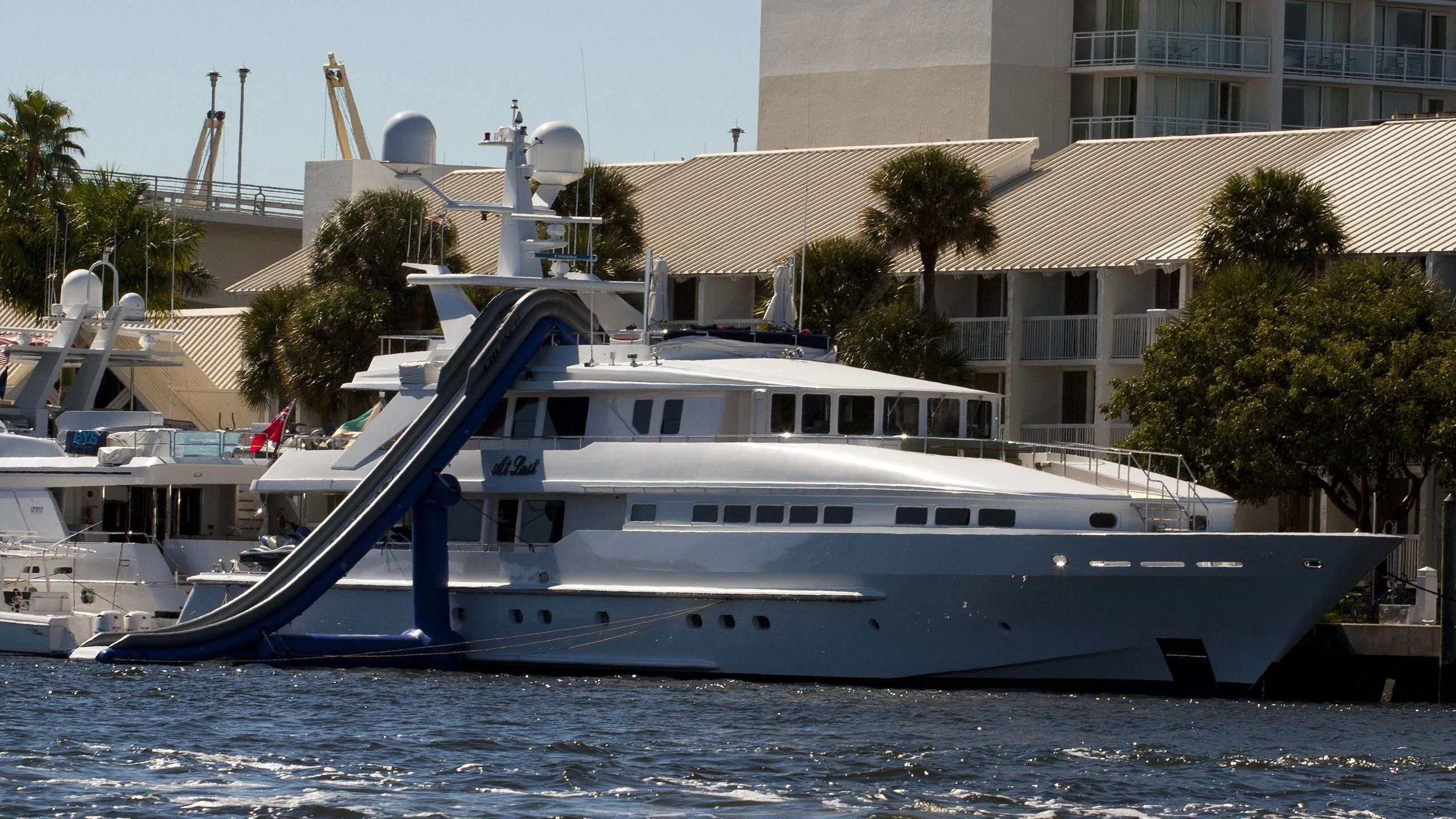 a large white boat in the water aboard AT LAST Yacht for Charter