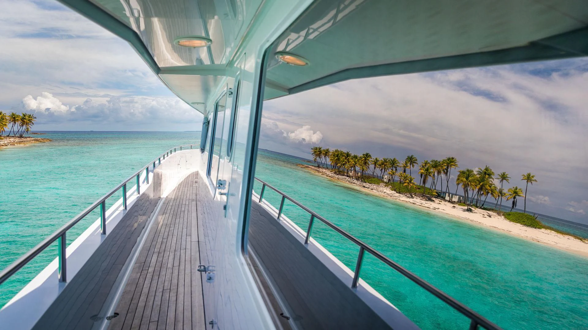a long boardwalk leading to a beach aboard AT LAST Yacht for Charter