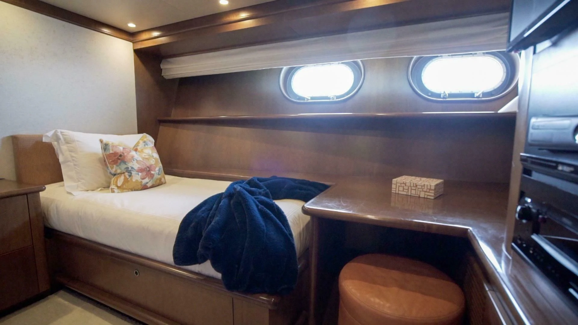 a bed in a room aboard AT LAST Yacht for Charter