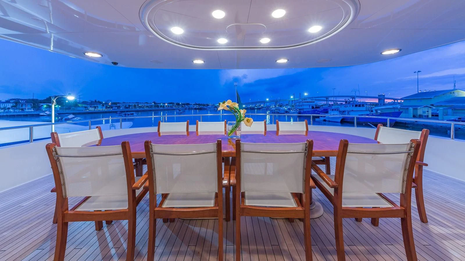 a table set up for a dinner party aboard AT LAST Yacht for Charter